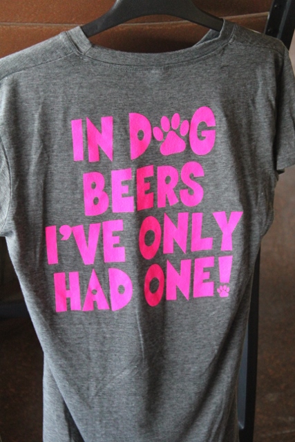 A person wearing an "In Dog Beers I've Only Had One" t-shirt in Dunedin, Florida