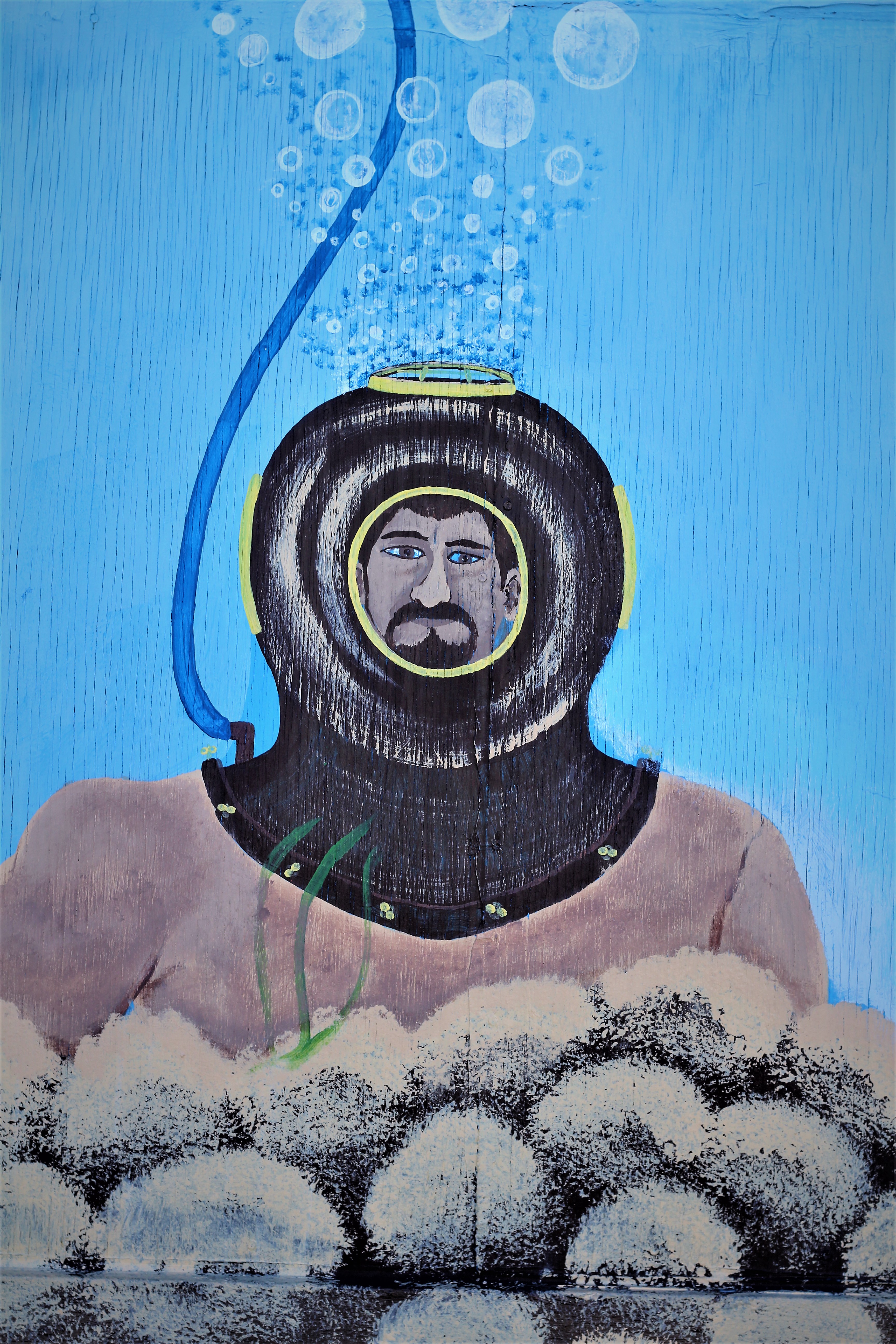 Mural of a Greek sponge diver in traditional diving helmet, Tarpon Springs